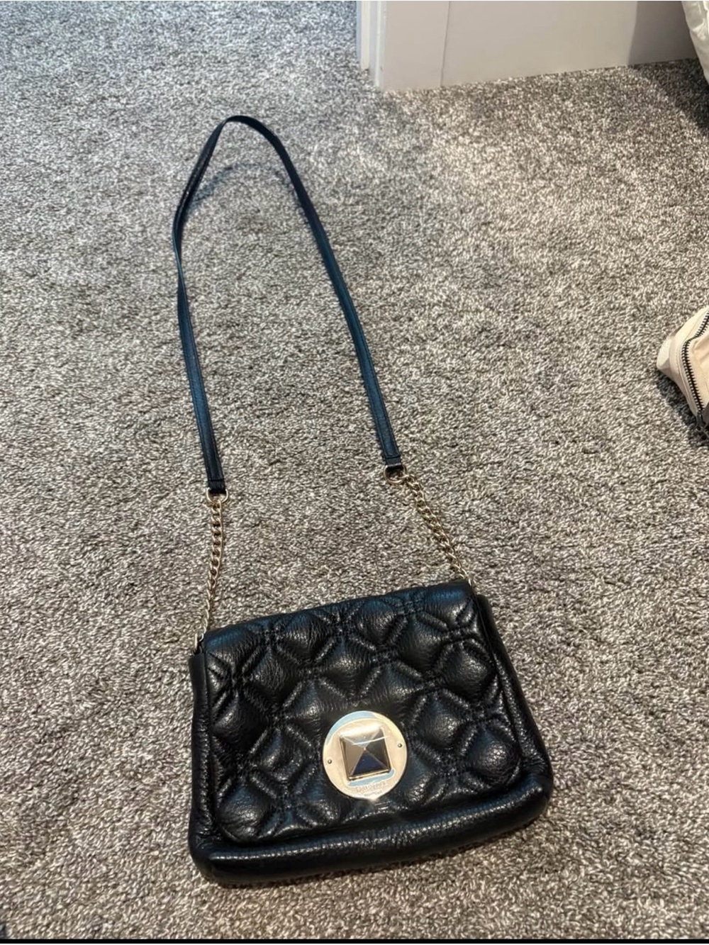 kate spade Black Quilted Crossbody with Gold-Tone Medallion